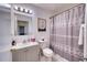 Bathroom with gray vanity and shower/tub combo at 6334 Yellowtop Dr, Lakewood Ranch, FL 34202