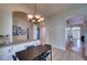 Kitchen views from dining area with access to other rooms at 6334 Yellowtop Dr, Lakewood Ranch, FL 34202