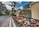 WaterCrest community entrance with landscaped flowers and signage at 6450 Watercrest Way # 304, Lakewood Ranch, FL 34202