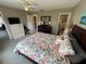 Primary bedroom with backyard access and built-in dresser at 6504 Bowdoin Pl # 15, Bradenton, FL 34207