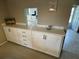 White built-in cabinets and drawers with quartz countertop at 6504 Bowdoin Pl # 15, Bradenton, FL 34207