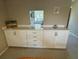 White built-in cabinets and drawers with quartz countertop at 6504 Bowdoin Pl # 15, Bradenton, FL 34207