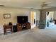 Living room with comfortable seating and access to other rooms at 6504 Bowdoin Pl # 15, Bradenton, FL 34207