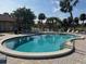 Enjoy this kidney-shaped community pool at 6504 Bowdoin Pl # 15, Bradenton, FL 34207