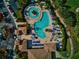 Overhead view of the luxury pool showcasing the sparkling blue water and lounge areas at 7005 River Hammock Dr # 301, Bradenton, FL 34212