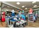 Brightly lit store showcasing golf apparel, shoes, and accessories on display tables and shelves at 7005 River Hammock Dr # 301, Bradenton, FL 34212