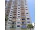 Multi-story building with balconies and water view at 7050 Sunset S Dr # 601, South Pasadena, FL 33707