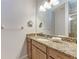 Bathroom with granite countertop and walk-in shower at 7325 Skybird Rd # 7325, Bradenton, FL 34209