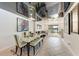 Modern dining room with glass table and artwork at 7325 Skybird Rd # 7325, Bradenton, FL 34209