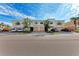 Front view of townhouses with attached garages and landscaping at 7325 Skybird Rd, Bradenton, FL 34209