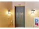 Condo entrance with address number 7325 and exterior lighting at 7325 Skybird Rd, Bradenton, FL 34209