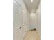 Bright hallway with tile flooring and multiple closets at 7325 Skybird Rd # 7325, Bradenton, FL 34209