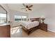 Spacious main bedroom with large windows and lake view at 7325 Skybird Rd, Bradenton, FL 34209