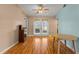 Bright dining room with hardwood floors and French doors leading outside at 8009 55Th E St, Palmetto, FL 34221