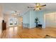 Spacious living room featuring hardwood floors and ceiling fans at 8009 55Th E St, Palmetto, FL 34221