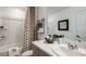 Bathroom with shower/tub combo and contemporary design at 8572 Daybreak St, Sarasota, FL 34241