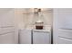 Laundry closet with washer and dryer, and shelving at 8716 Winter Breeze Way, Sarasota, FL 34241