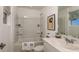 Simple bathroom with a shower/tub combo and white vanity at 8968 Daybreak St, Sarasota, FL 34241