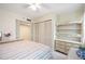 Light and airy bedroom with built-in shelving at 33 S Gulfstream Ave # 808, Sarasota, FL 34236