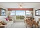 Bright dining area with ocean view and seating at 33 S Gulfstream Ave # 808, Sarasota, FL 34236