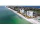 Oceanfront condo building with pool and tennis court at 1000 Longboat Club Rd # 304, Longboat Key, FL 34228