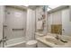 Bathroom with a tub, shower, toilet and vanity at 1000 Longboat Club Rd # 304, Longboat Key, FL 34228