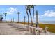 Relaxing patio furniture and beach access steps from the condo at 1000 Longboat Club Rd # 304, Longboat Key, FL 34228