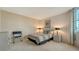 Well-lit bedroom with a queen bed and modern nightstands at 1000 Longboat Club Rd # 304, Longboat Key, FL 34228