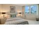 Bright bedroom with a comfortable bed and plenty of natural light at 1000 Longboat Club Rd # 304, Longboat Key, FL 34228