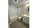 Updated bathroom with new vanity and tub shower combo at 10607 3Rd St, Thonotosassa, FL 33592