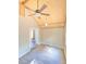 Bedroom with vaulted ceiling, wood-look floors, and ceiling fan at 10607 3Rd St, Thonotosassa, FL 33592