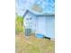 Side view of light blue house with AC unit at 10607 3Rd St, Thonotosassa, FL 33592