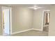 Open living area with doors leading to other rooms at 10607 3Rd St, Thonotosassa, FL 33592