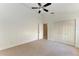 Spacious bedroom with ceiling fan and ample closet space at 1104 83Rd Nw St, Bradenton, FL 34209