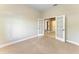 Spacious bedroom with carpet and French doors at 1104 83Rd Nw St, Bradenton, FL 34209