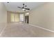 Spacious bedroom with ceiling fan and ample closet space at 1104 83Rd Nw St, Bradenton, FL 34209