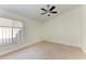 Well-lit bedroom featuring a ceiling fan and window at 1104 83Rd Nw St, Bradenton, FL 34209