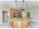 Modern kitchen with granite countertops and island at 1104 83Rd Nw St, Bradenton, FL 34209