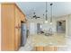 Kitchen boasts granite countertops and an island with seating at 1104 83Rd Nw St, Bradenton, FL 34209