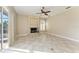 Bright living room with tile floors and a fireplace at 1104 83Rd Nw St, Bradenton, FL 34209