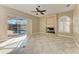 Living room features tile floors, fireplace and sliding doors to pool at 1104 83Rd Nw St, Bradenton, FL 34209