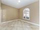 Bright office with arched window and tile floor at 1104 83Rd Nw St, Bradenton, FL 34209