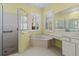 Primary bathroom with corner soaking tub and walk-in shower at 11264 28Th Street E Cir, Parrish, FL 34219