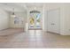 Elegant entryway with double doors and tile flooring at 11264 28Th Street E Cir, Parrish, FL 34219