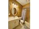 Clean bathroom with white vanity and shower/tub combo at 1170 Richter St, Port Charlotte, FL 33952