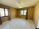 Spacious bedroom with tiled floors and two windows at 1170 Richter St, Port Charlotte, FL 33952