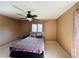 Bright bedroom with tiled floors and ceiling fan at 1170 Richter St, Port Charlotte, FL 33952