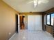 Bedroom with tiled floors and double door closet at 1170 Richter St, Port Charlotte, FL 33952