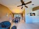 Bright dining room with table and chairs, looking toward living room at 1170 Richter St, Port Charlotte, FL 33952