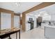 White kitchen with stainless steel appliances and granite countertops at 1170 Richter St, Port Charlotte, FL 33952